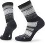 Pair of black socks with gray and white patterned bands.
