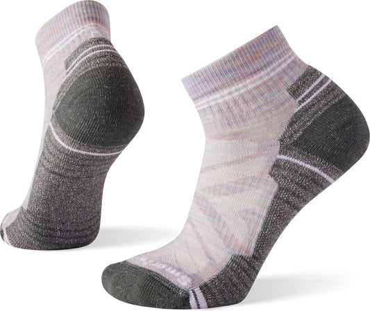 A pair of gray, short-cut socks with pink accents.