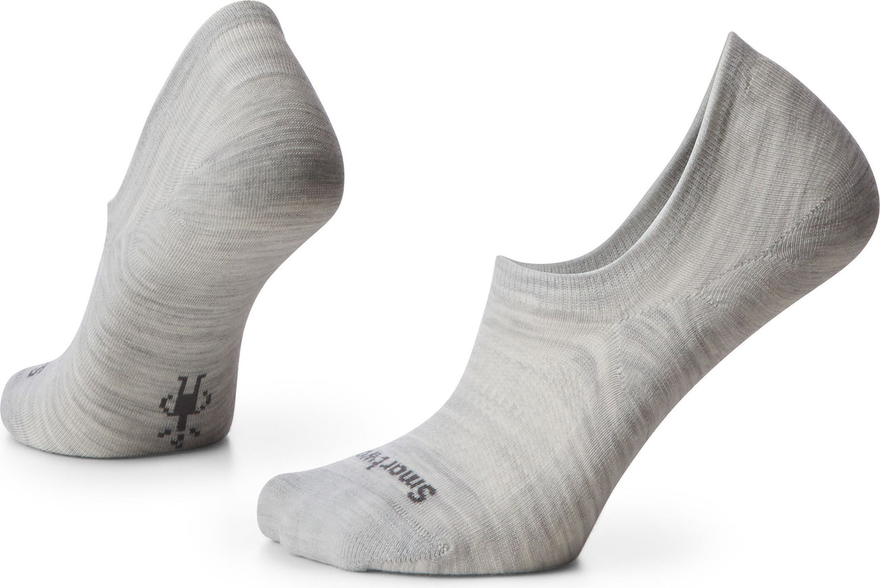 Two grey no-show socks, one upright and one on its side with a logo on the heel.