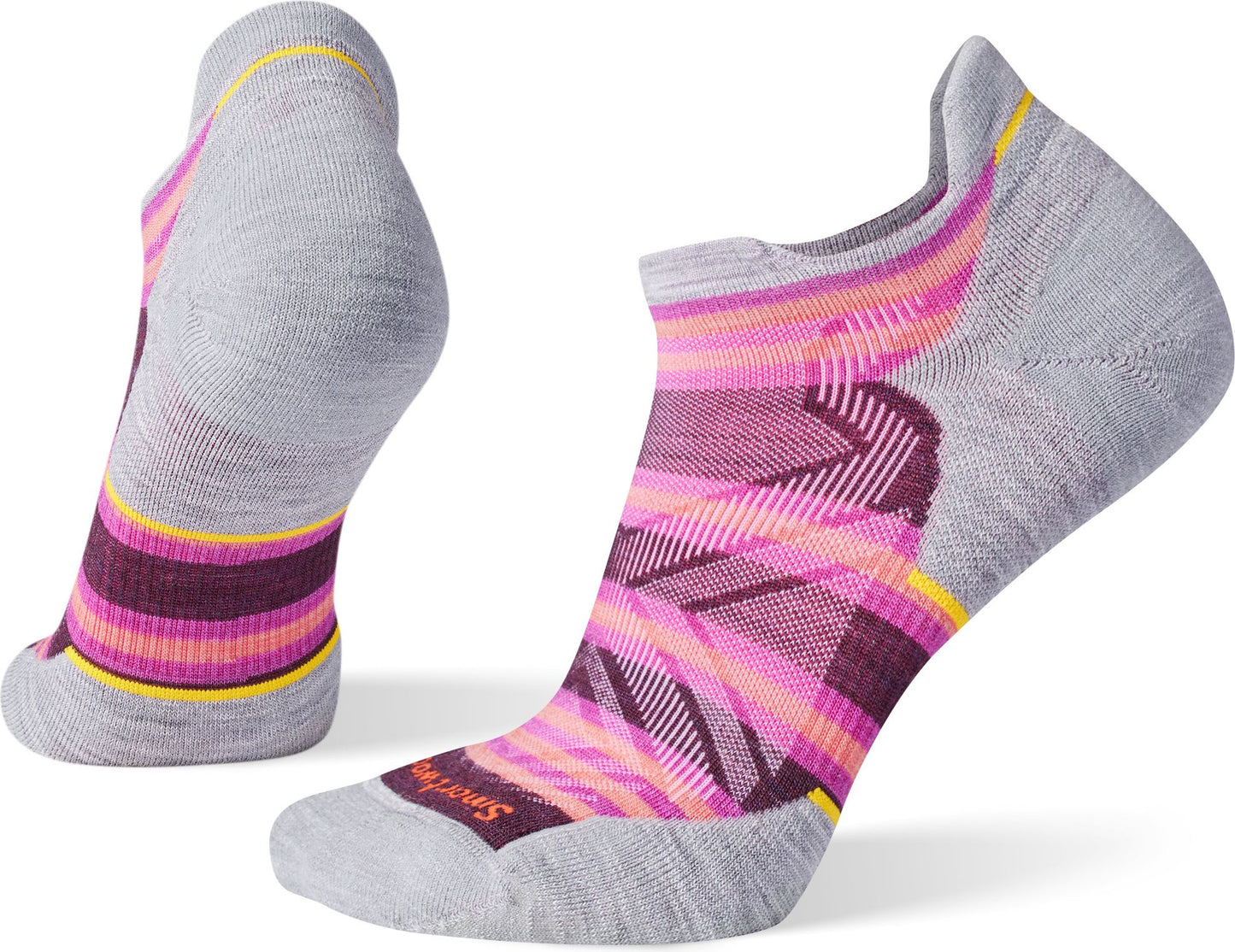 Pair of gray running socks, one standing on its heel, decorated with purple, pink, and orange stripes.