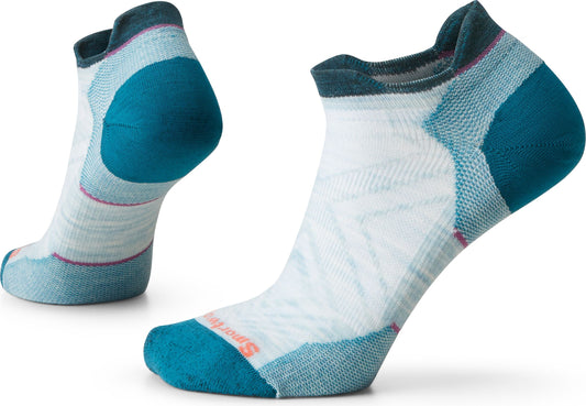 Two athletic socks; the socks are white with blue heels and toes.