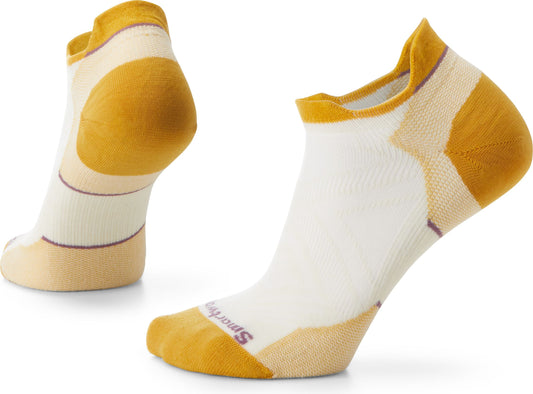 Pair of low-cut socks with white body, yellow heel and toe, and purple stripe detail.