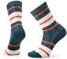 Two blue socks with white and red stripes.