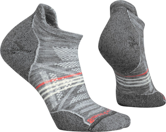 Two gray athletic socks, one displaying its inner side, with red and white stripes.