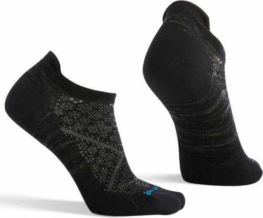Pair of black, no-show socks with gray patterned design and teal accent on the toes.