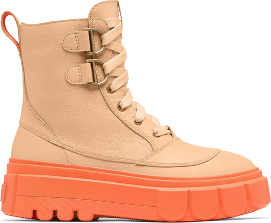 A women's beige leather lace-up boot with bronze buckles and an orange lug sole.
