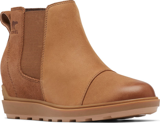 Tan ankle boot with elastic panels and a low wedge sole.