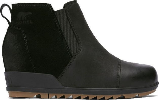 Black wedge-heel slip-on ankle boot with suede panels and ribbed goring.