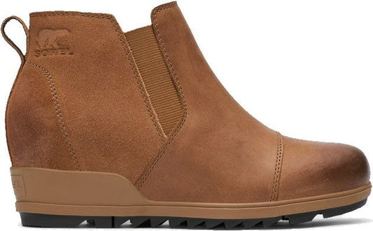 Tan ankle boot with elastic goring, leather cap toe and wedge heel.