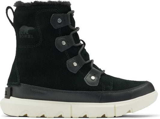 Black suede boot with laces, a light-colored sole, and faux fur trim.