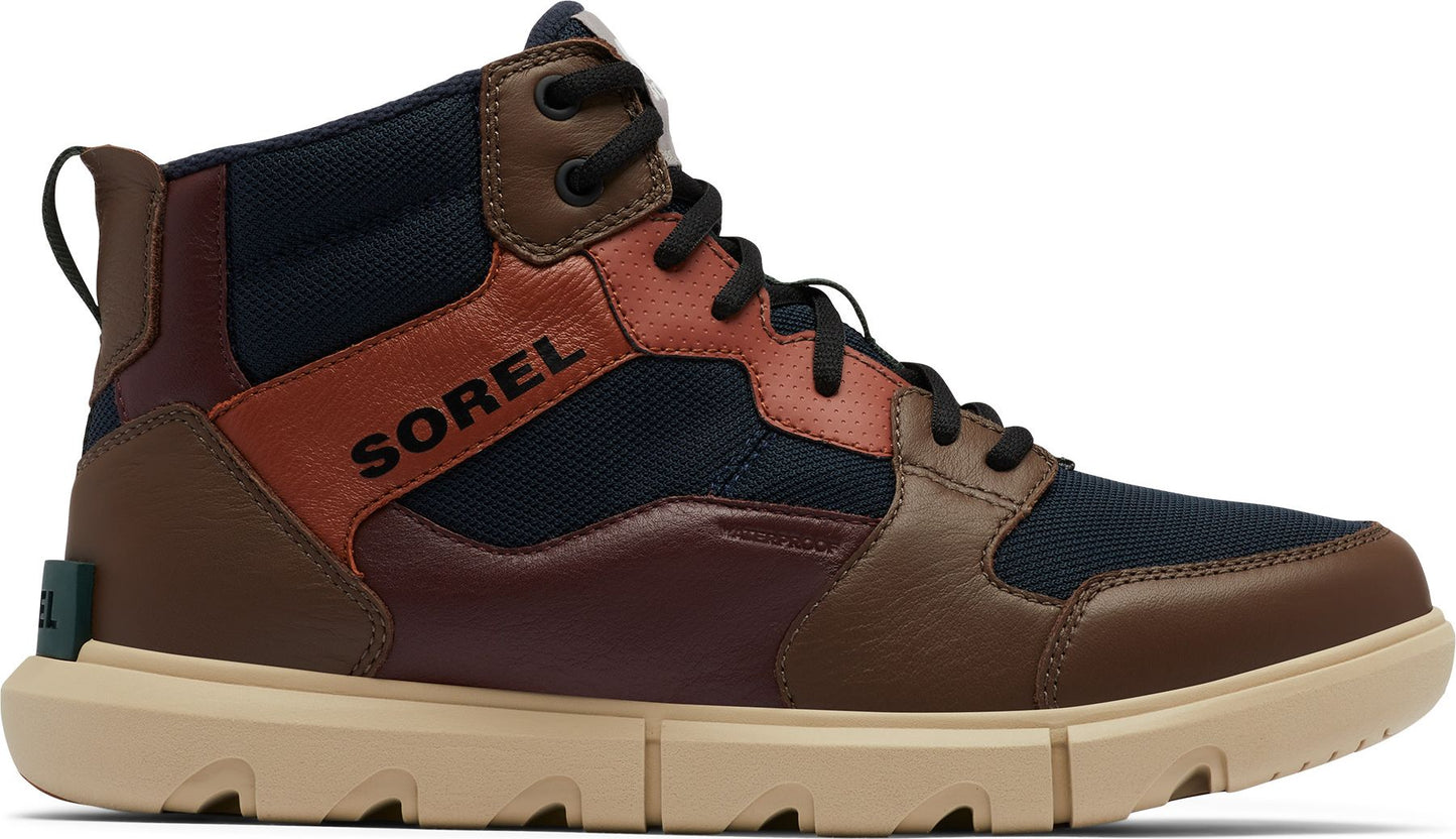 High-top casual shoe with brown, red, and dark blue panels and the word SOREL on the side.