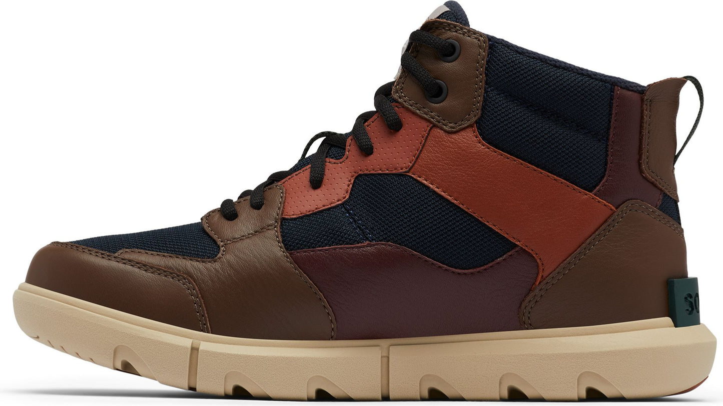 A multi-colored Sorel high-top shoe with brown leather, blue canvas, black laces, and a tan sole.