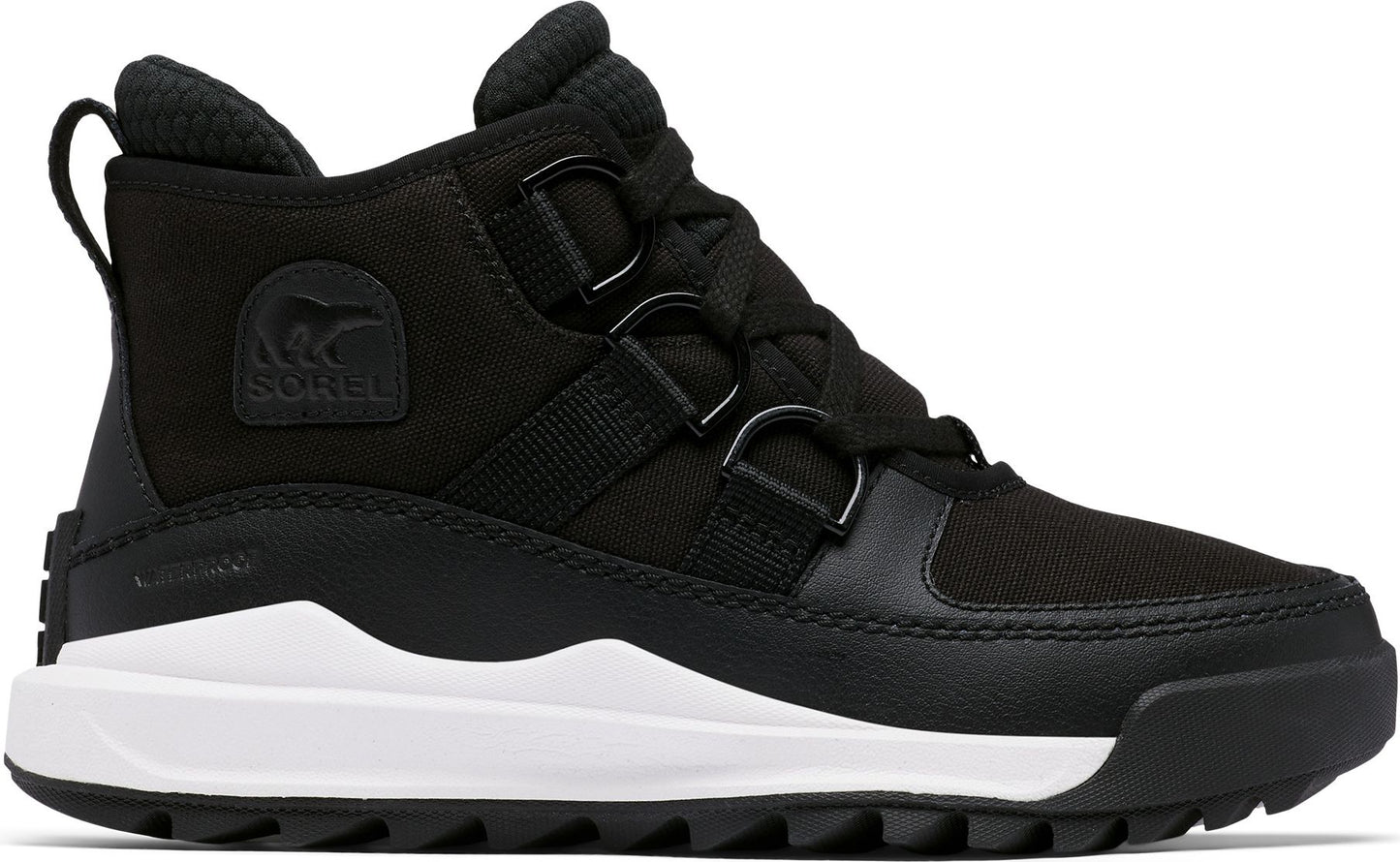 Black mid-top boot with laces, a SOREL logo patch, a white midsole, and a black outsole.