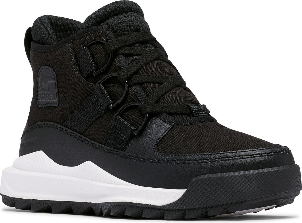Black ankle boot with laces and white sole.