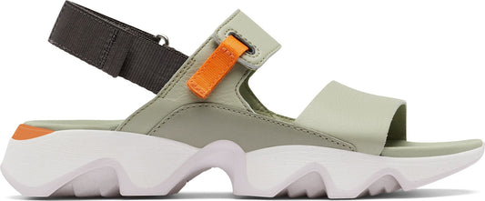 A chunky sandal with a white sculptural sole, and a light green leather upper with a dark grey ankle strap and orange pull tab.