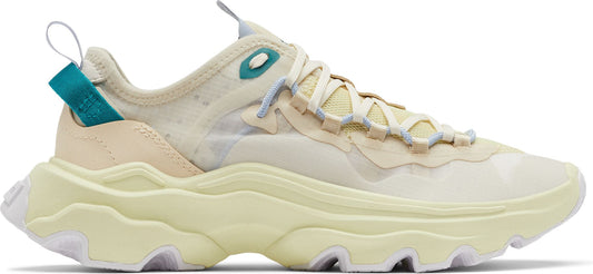 A sneaker with a thick, wavy, pale yellow sole and a cream-colored upper with blue accents.