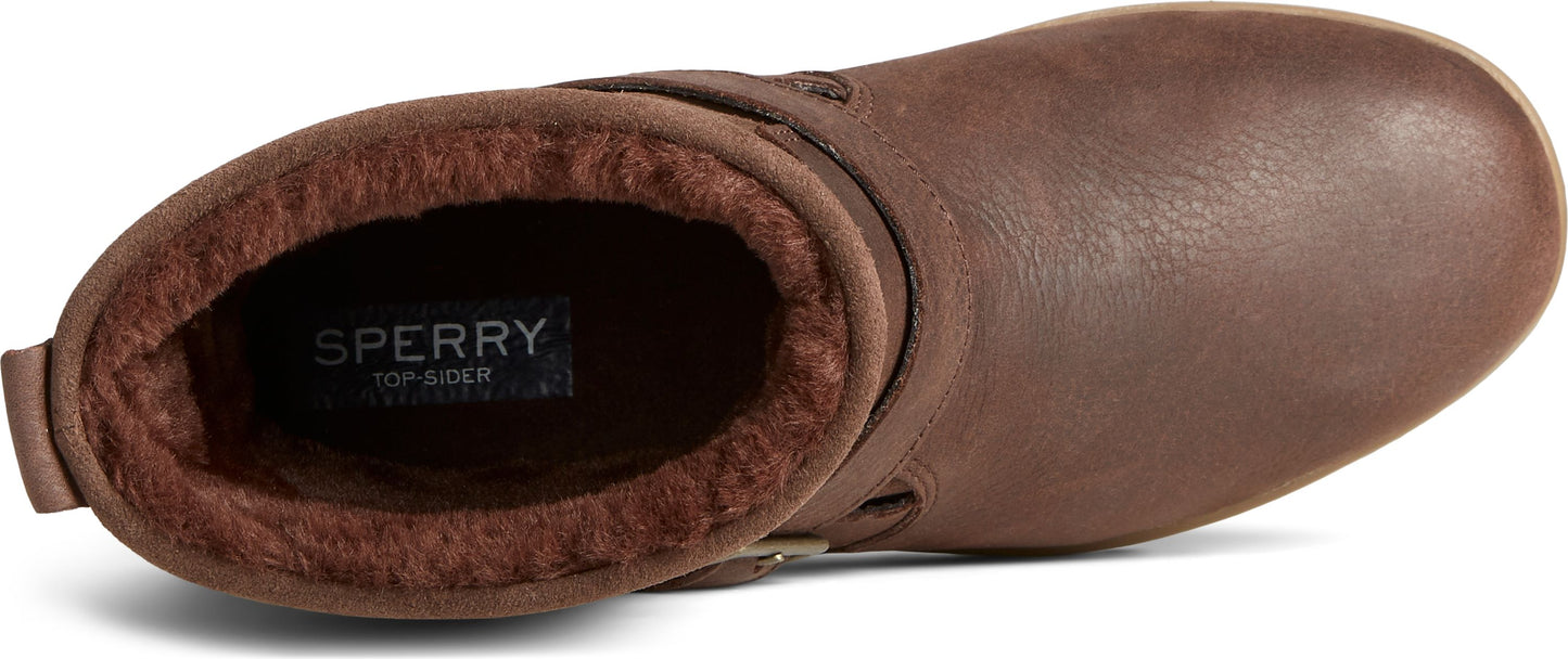 A brown ankle boot with a fuzzy interior and buckle.