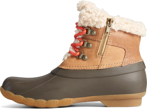 Side view of a tan and brown boot with a sherpa collar, bronze side zipper, and red and tan laces.