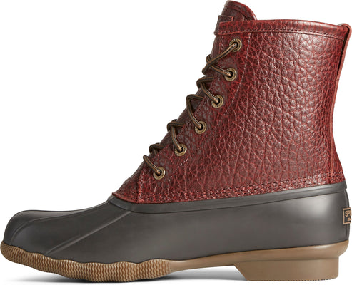 Mid-height dark grey rubber duck boot with dark reddish-brown textured leather shaft and laces.
