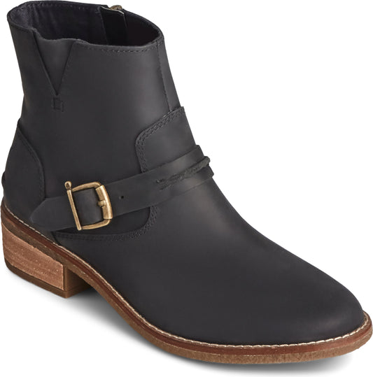 Black leather ankle boot with side buckle and low wood-tone heel.