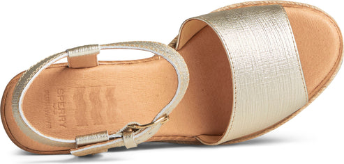 Gold sandal with an ankle strap.