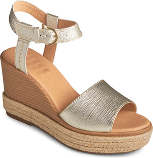 A women's gold-colored wedge sandal with an ankle strap and a jute-wrapped sole.