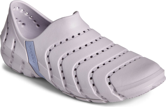 Lavender slip-on shoe with side logo, horizontal ridges, and ventilation holes.