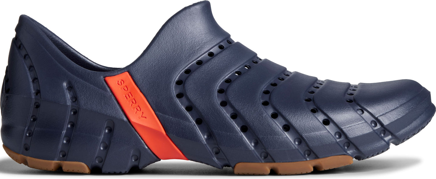 A blue shoe with an orange accent on the side and a brown sole.