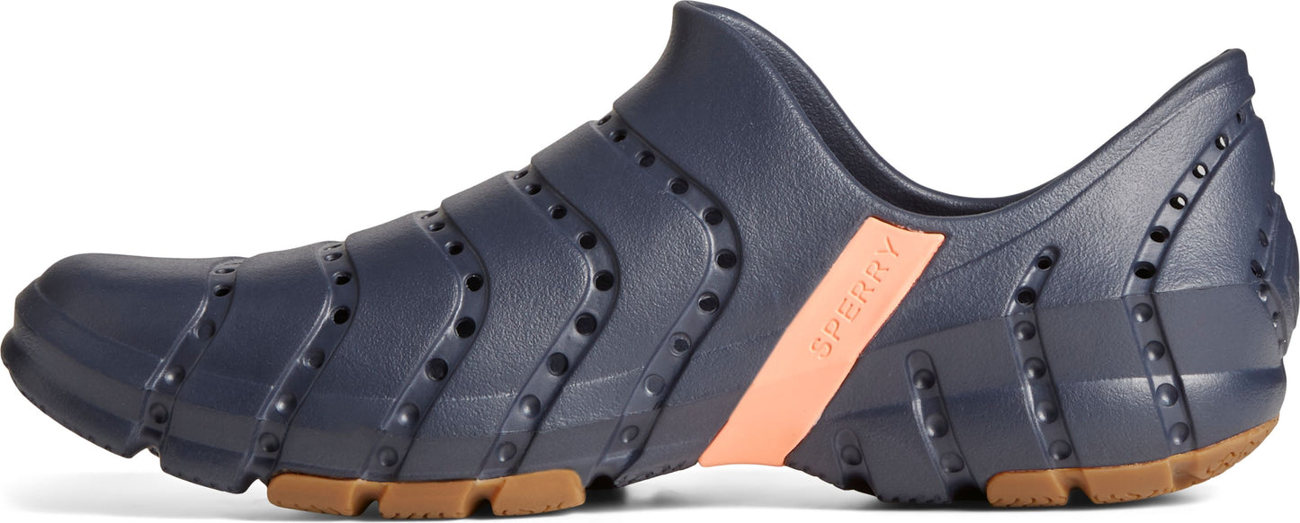 Navy blue slip-on shoe with round holes and a zig-zag design.