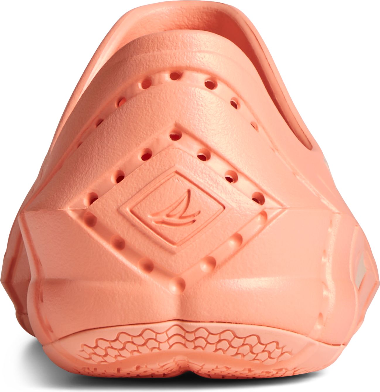 Rear view of an orange clog with diamond-shaped ventilation holes.
