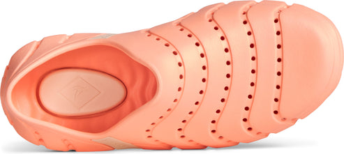 Peach-colored clog with drainage holes along the side.
