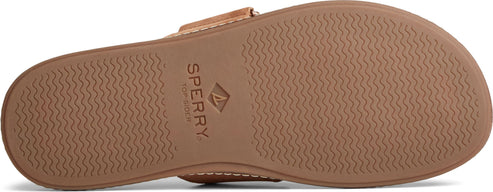 Tan sole with wavy tread and Sperry logo.
