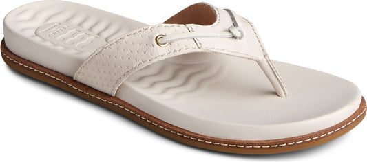white sandal with a brown trim