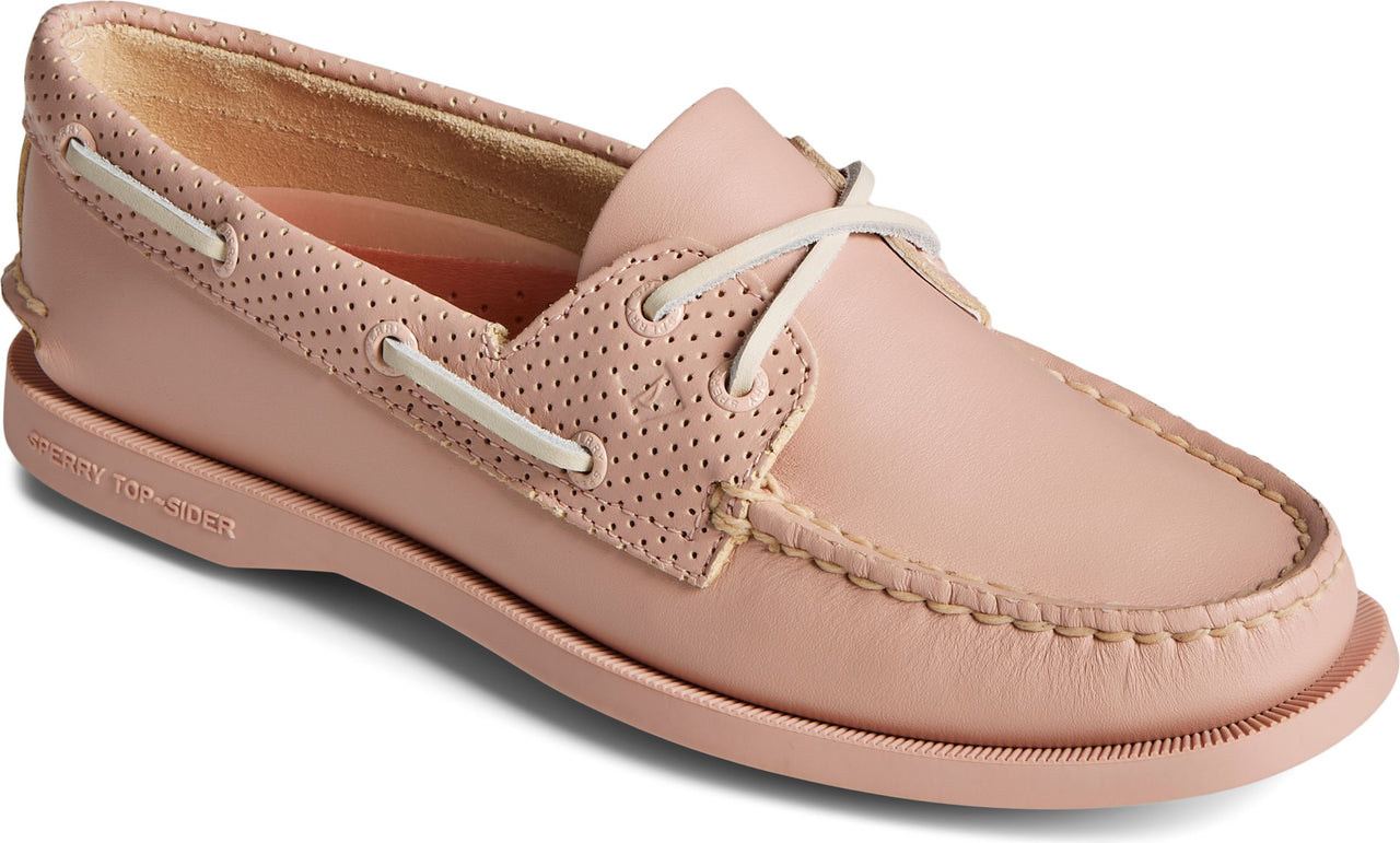 Salmon-colored boat shoe with white laces.