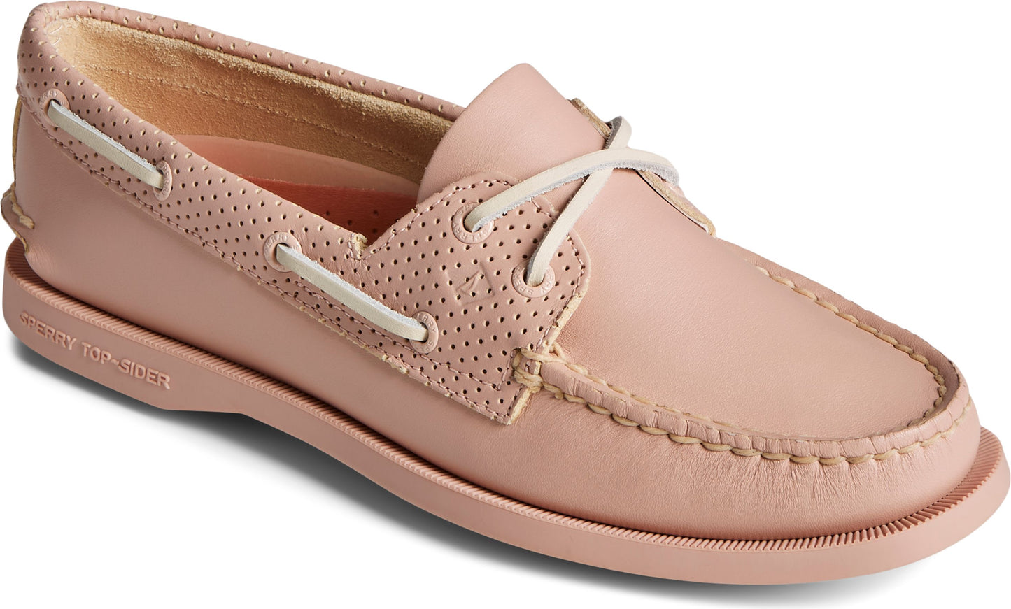 Salmon-colored boat shoe with white laces.