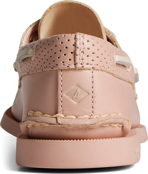 Close-up back view of a pink, leather boat shoe with a non-slip rubber sole and a perforated leather upper.