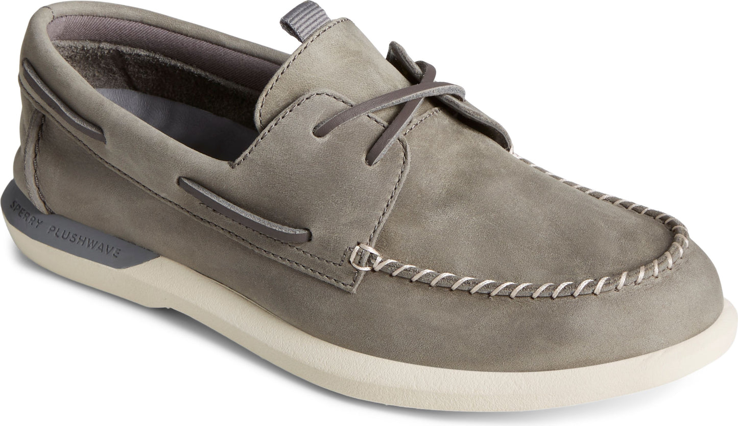 Gray boat shoe with white stitching on a white sole.
