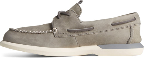 A gray boat shoe with gray laces.