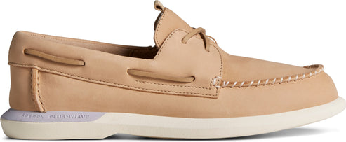 A tan-colored boat shoe with a white sole.