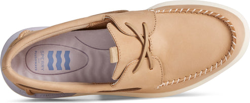 Tan boat shoe with white stitching.