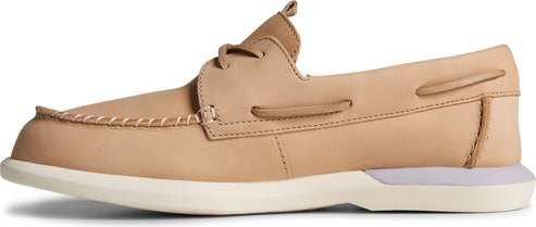 Tan boat shoe with white sole.