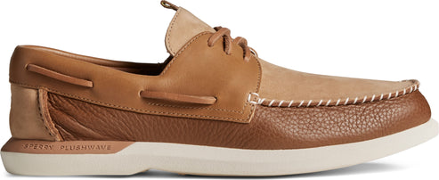 Two-tone leather boat shoe with visible white stitching and white sole.