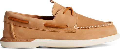 Tan leather boat shoe with white stitching and a white sole.