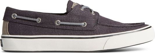 A low-cut, dark gray boat shoe with gray laces and a white sole.