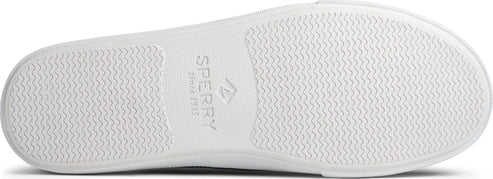 White shoe sole with subtle wave pattern and Sperry logo.