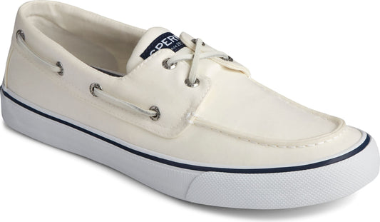 White boat shoe with white laces and white rubber sole and blue stripe.