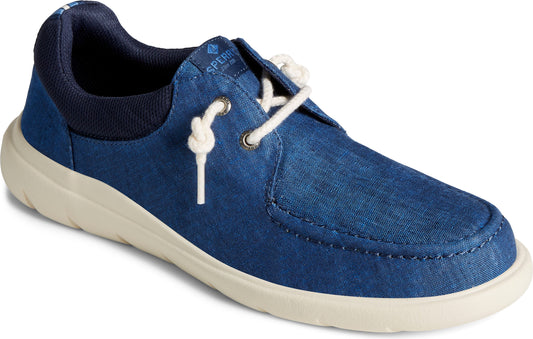Blue boat shoe with white laces and a white sole.