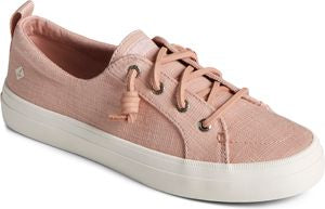Pink low-top sneaker with white sole and laces.
