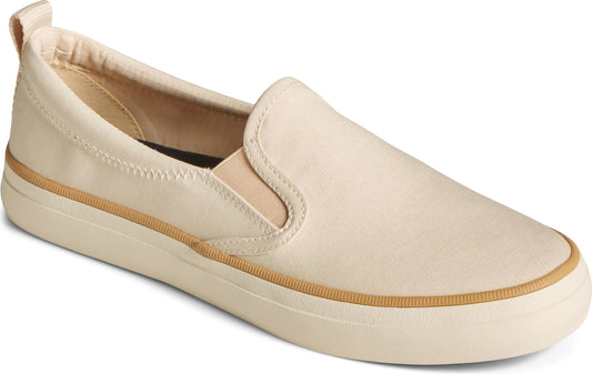 Beige slip-on shoe with a tan stripe around the sole and a fabric loop at the heel.