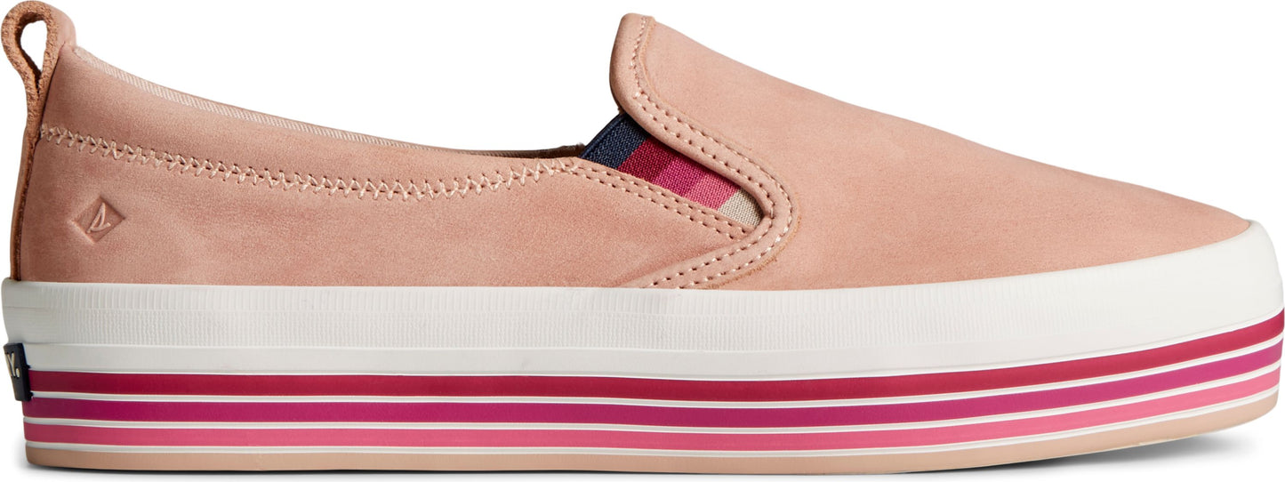 Slip-on shoe with a thick striped sole.